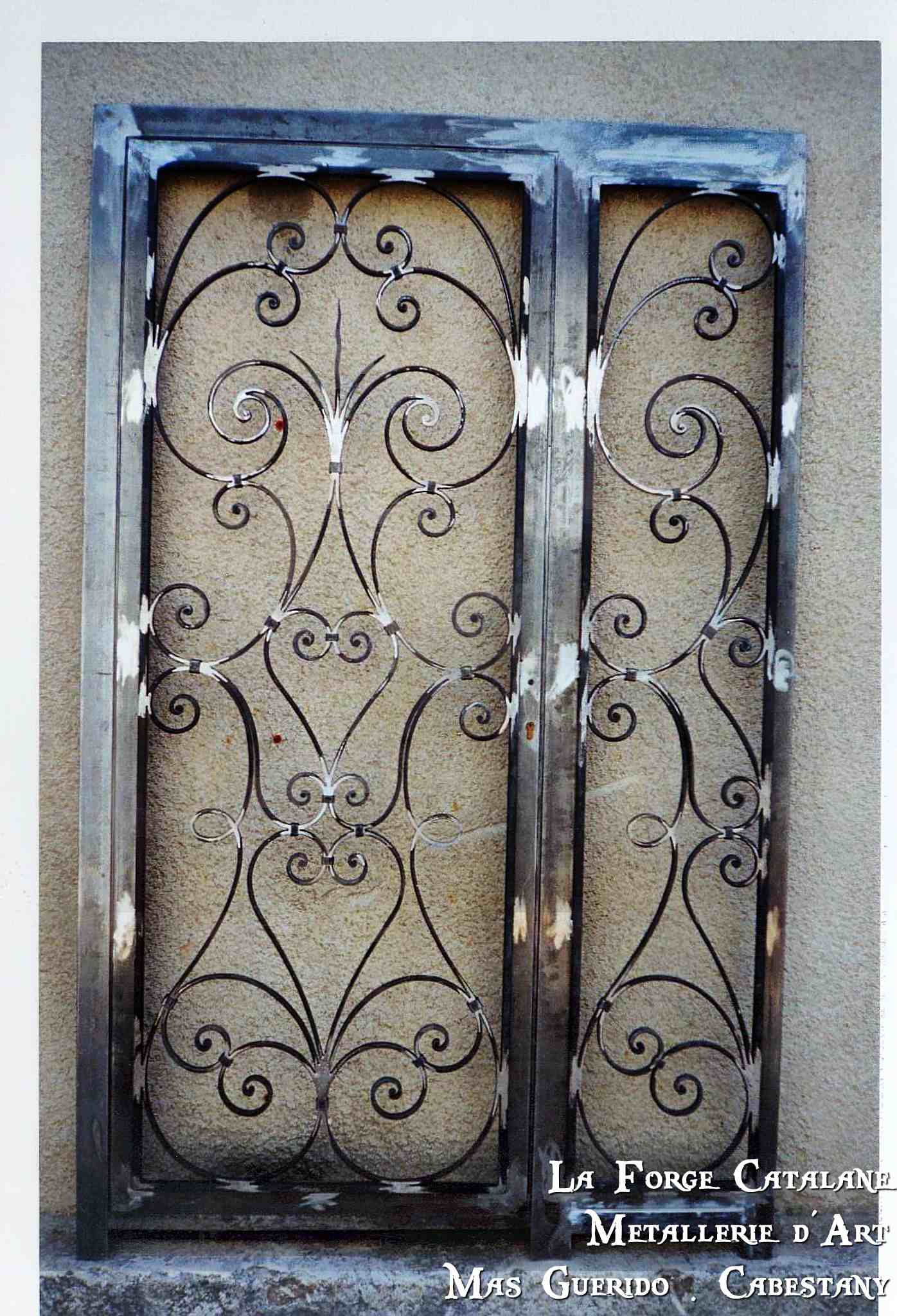 grille articulee semi fixe volutes forge catalane.jpg